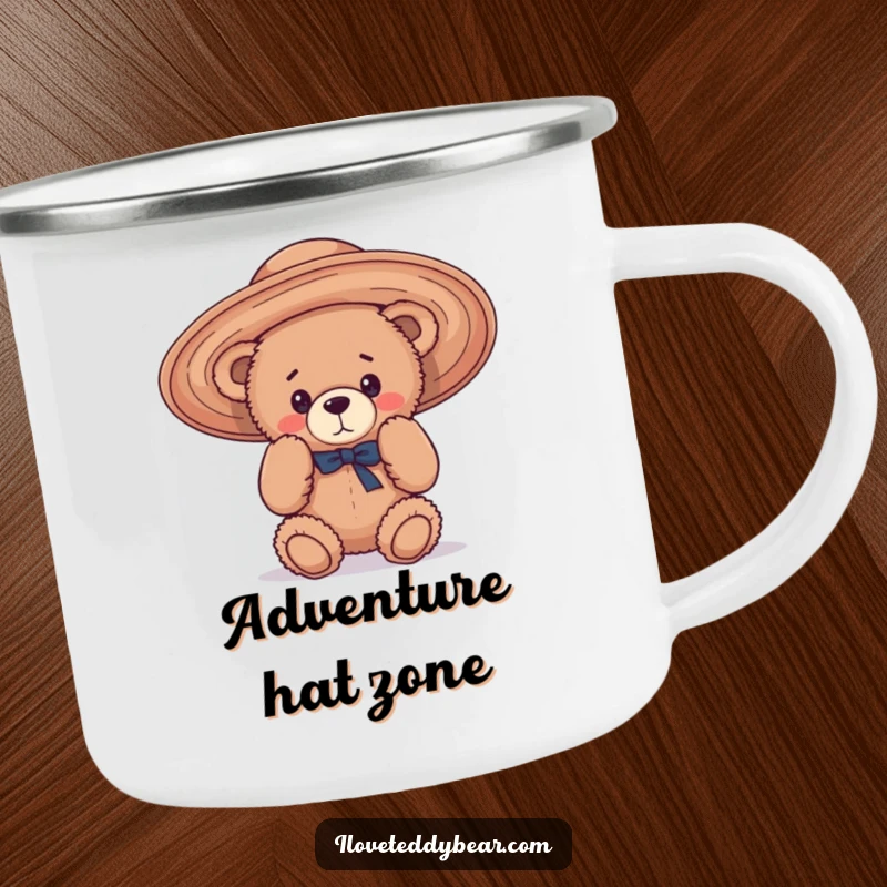 Funny Camping Mug showing a teddy bear hilariously trying to wear an oversized, floppy hat, perfect for adding humor to outdoor trips.