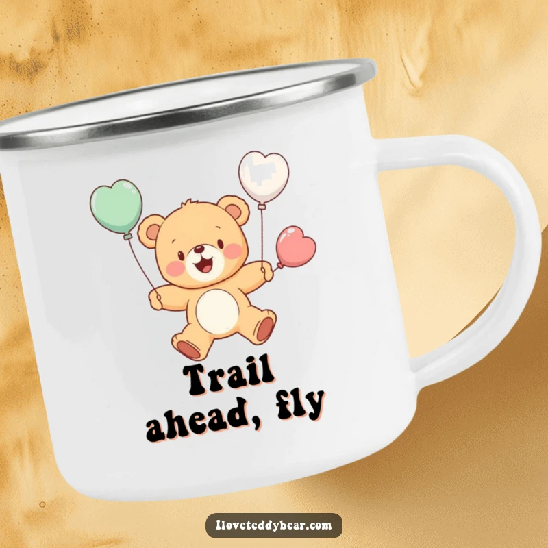 Funny camping mug with a cheerful teddy bear attempting to fly using balloon wings, ideal for outdoor inspiration. A wonderful funny gift.