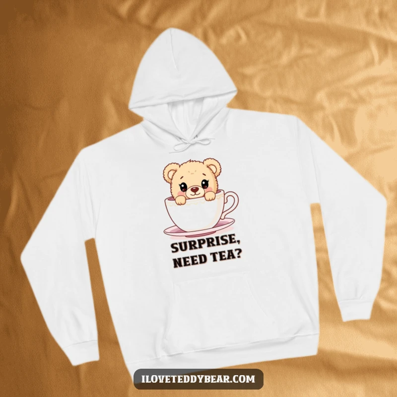 Funny Hoodie featuring a curious teddy bear peeking from behind an enormous teacup, blending warmth with adorable charm for ultimate comfort.