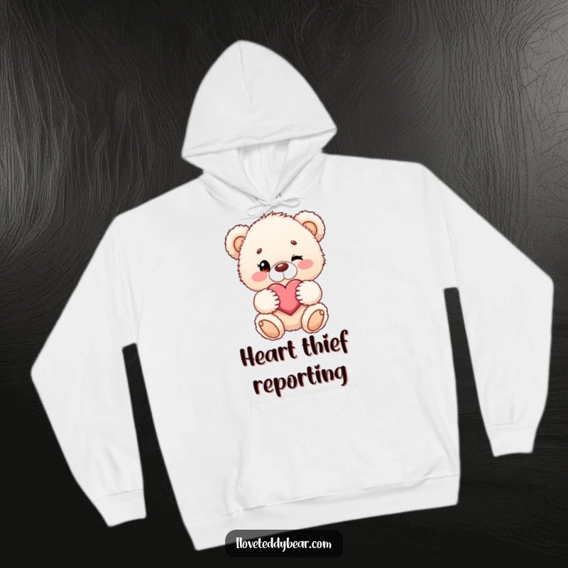 Funny hoodie with a fluffy teddy bear playfully winking and holding a heart, soft and warm for cuddles.