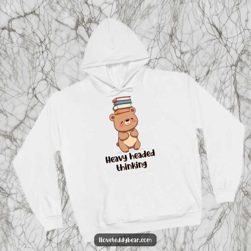 Funny, cozy hoodie featuring a bear giggling while precariously balancing a large stack of books on its head.