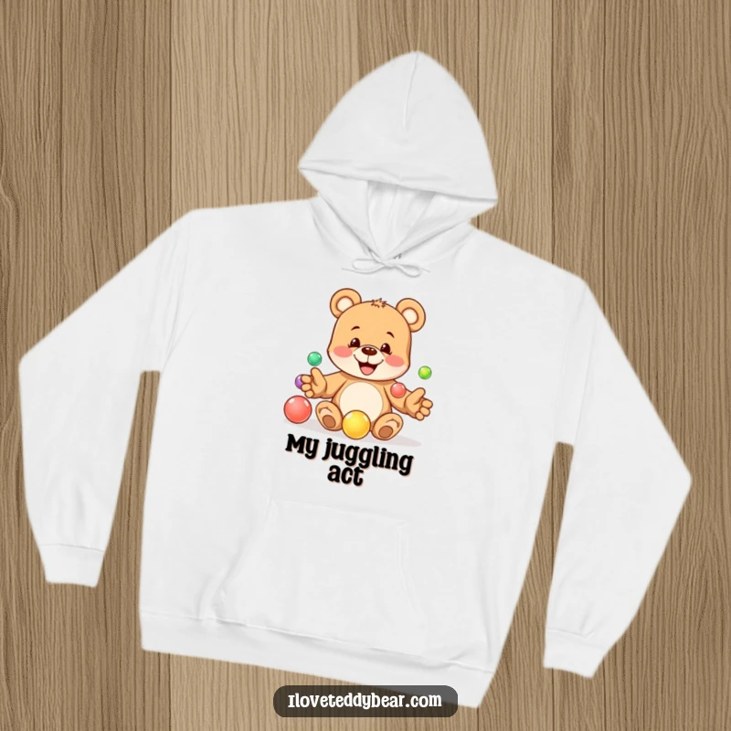 Funny hoodie depicting a playful teddy bear mischievously juggling five colorful marbles, a scene of joyful skill. A great funny gift.