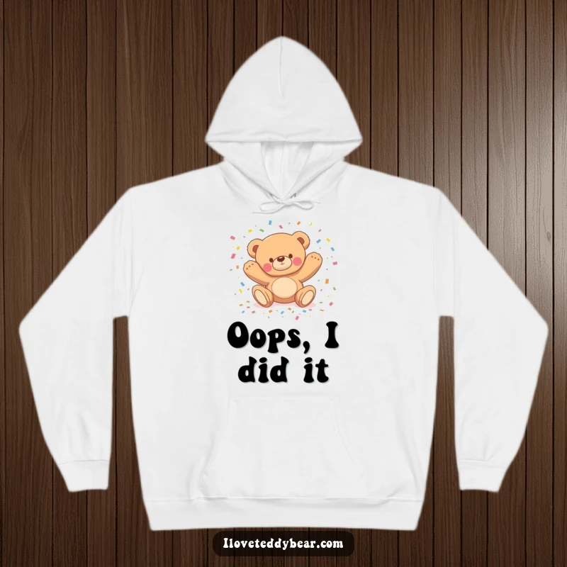 Funny hoodie featuring a teddy bear comically tripping and scattering confetti, offering warm comfort and a touch of playful disaster.