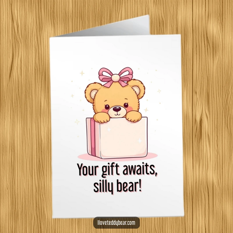 Funny Free Printable Birthday Card: Teddy bear peeking playfully from behind a giant sparkly present, ready to wish you a happy birthday.