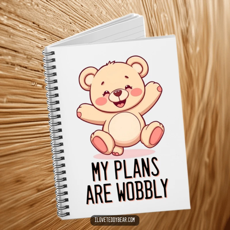 Funny notebook cover showcasing a smiling teddy bear performing a wobbly cartwheel. Great for journaling with a playful twist.