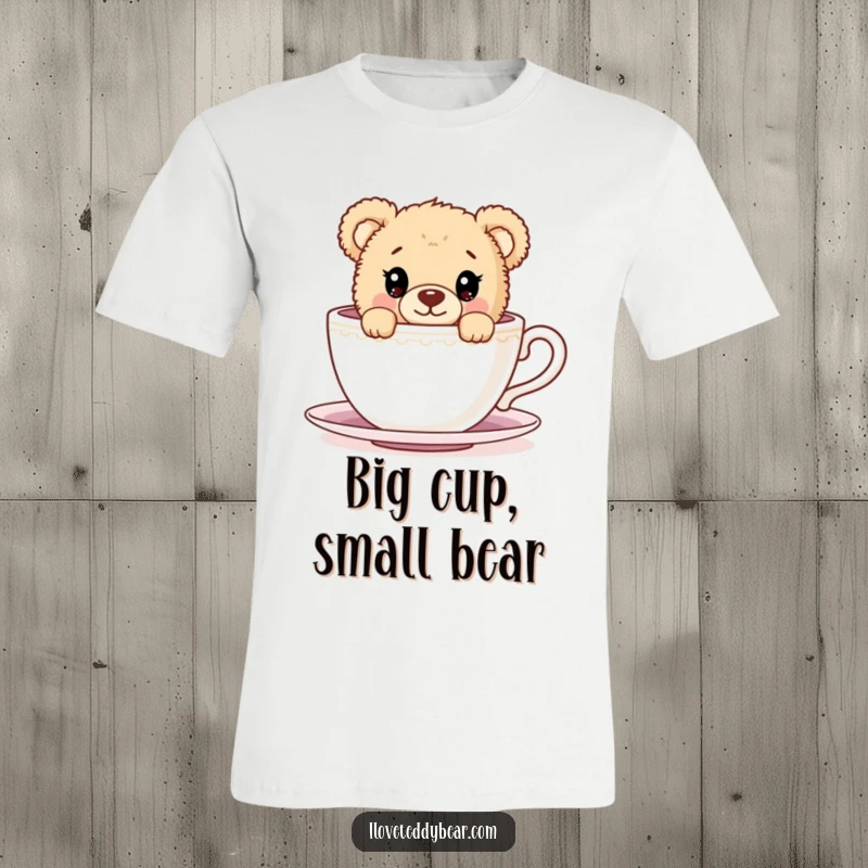 Funny T-Shirt with a charming teddy bear peeking with big eyes over the rim of a giant teacup, offering a delightful surprise.