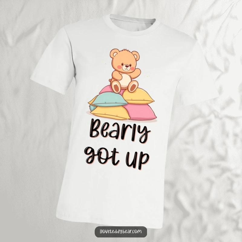 Funny t-shirt depicting a lovable teddy bear playfully losing its balance and landing softly on a stack of plush pillows.