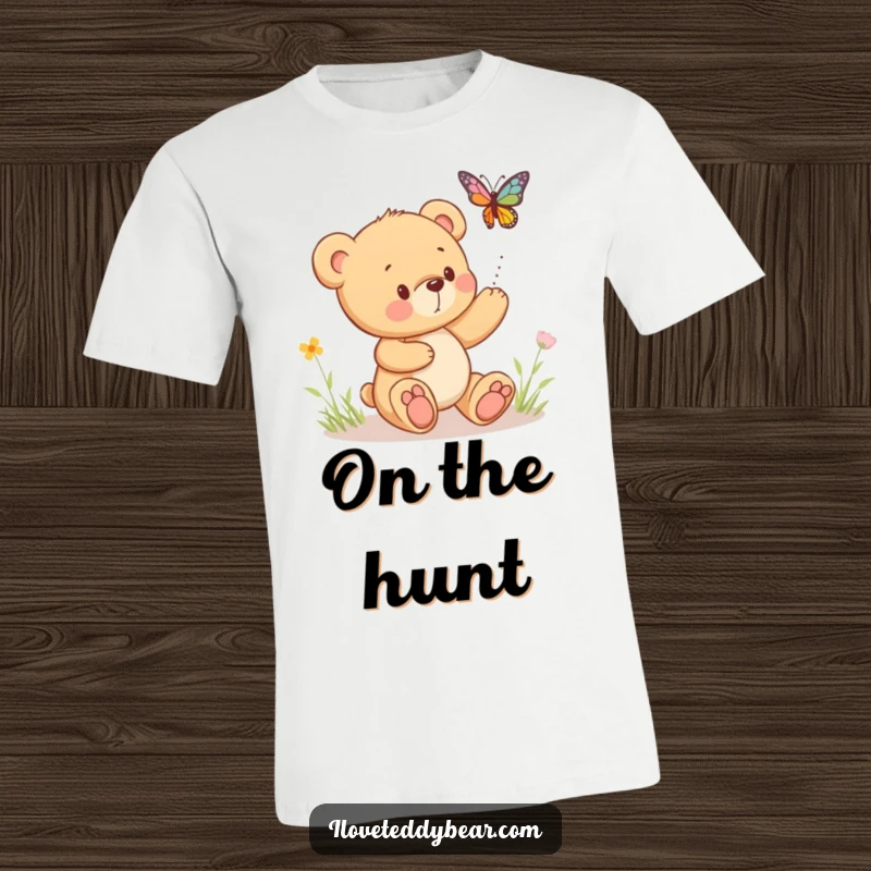 Funny t-shirt with a cute teddy bear playfully pursuing a bouncing butterfly, symbolizing joy and lighthearted adventure.